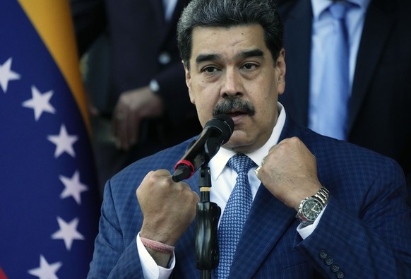Venezuela President Nicolás Maduro, speaks to the press after the visit of FIFA president Gianni Infantino at Miraflores Presidential Palace in in Caracas, Venezuela , Friday, Oct 15, 2021. (AP Photo/ ...