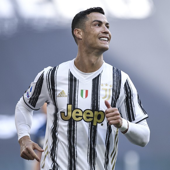 Juventus&#039; Cristiano Ronaldo celebrates after scoring during the Serie A soccer match between Juventus and Inter Milan, at the Turin Allianz stadium, Italy, Saturday, May 15, 2021. (Piero Cruciatt ...