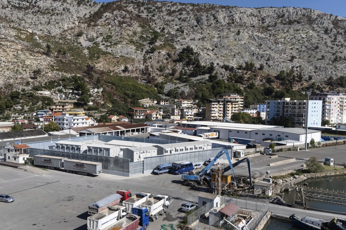 A general view of a migrant processing center at the port of Shengjin, northwestern Albania Wednesday, Oct. 16, 2024, as the first group of migrants who were intercepted in international waters arrive ...