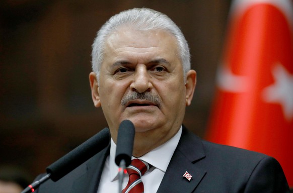 Turkey&#039;s Prime Minister Binali Yildirim addresses members of parliament from his ruling AK Party (AKP) during a meeting at the Turkish parliament in Ankara, Turkey, November 8, 2016. REUTERS/Umit ...