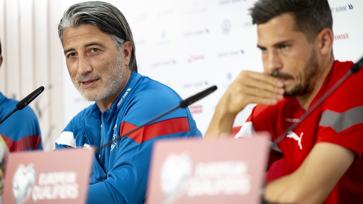 Switzerland's national team head coach Murat Yakin, left, and player Remo Freuler, right, speak during a press conference on the eve of the UEFA Euro 2024 qualifying group I soccer match between  ...