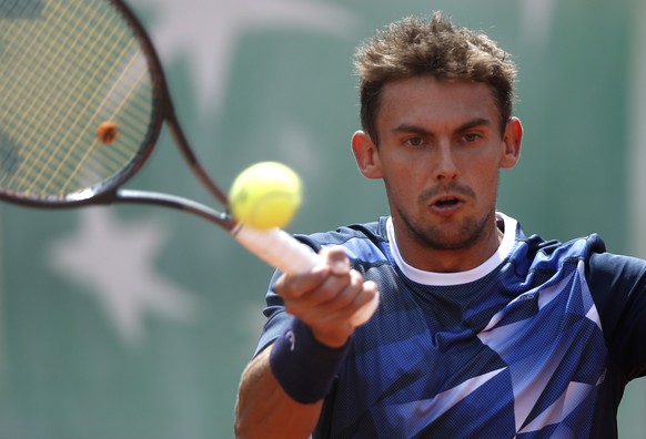epa07605769 Henri Laaksonen of Switzerland plays Pedro Martinez Portero of Spain during their men’s first round match during the French Open tennis tournament at Roland Garros in Paris, France, 27 May ...