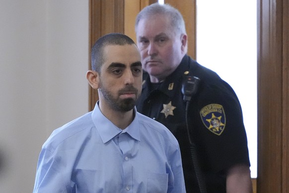 Hadi Matar is escorted into the courtroom at the Chautauqua County Courthouse ahead of the second day in his trial, Tuesday, Feb. 11, 2025, in Mayville, N.Y. Matar is charged with stabbing famed autho ...