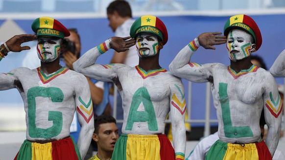 Supporters of Senegal pose prior to the group H match between Senegal and Colombia, at the 2018 soccer World Cup in the Samara Arena in Samara, Russia, Thursday, June 28, 2018. (AP Photo/Efrem Lukatsk ...