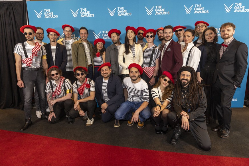 epa12586841 The Clair Obscure Expedition 33 team arrives to The Game Awards at the Peacock Theater in Los Angeles, California, USA, 11 December 2025. The Game Awards recognizes creative and technical  ...