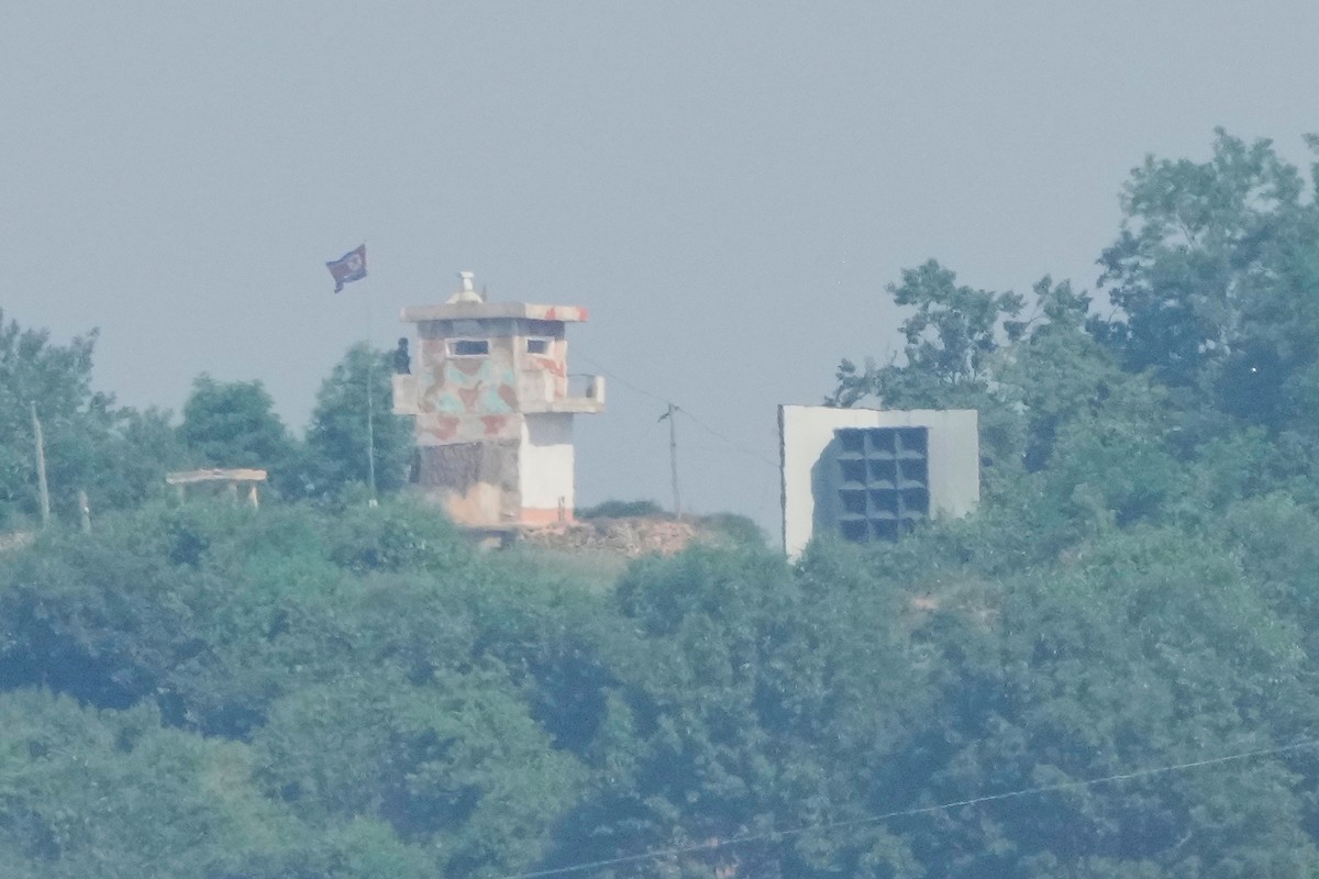 FILE - A North Korean military guard post, left, and loudspeaker are seen from Paju, South Korea, near the border with North Korea, June 12, 2025. (AP Photo/Ahn Young-joon, File)
Koreas Tensions