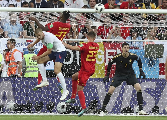 Belgium&#039;s Michy Batshuayi, second from left, and Belgium&#039;s Leander Dendoncker defend against England&#039;s Eric Dier during the group G match between England and Belgium at the 2018 soccer  ...