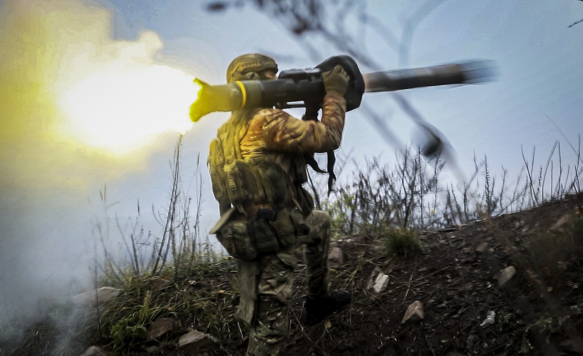 A Ukrainian soldier fires an anti-tank missile at an undisclosed location in the Donetsk region, Ukraine, Thursday, Nov. 17, 2022. (AP Photo/Roman Chop)