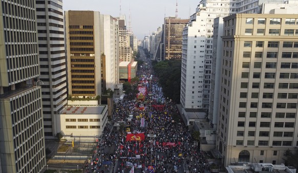 Demonstrators march on in Paulista Avenue to demand that Brazilian President Jair Bolsonaro resign, in Sao Paulo, Brazil, Saturday, July 3, 2021. A new filing for impeachment charges against Bolsonaro ...