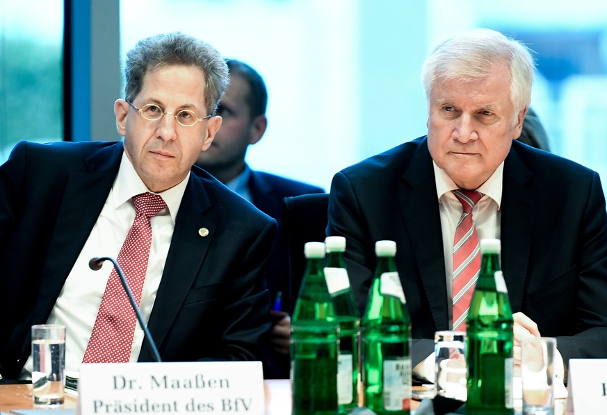 epa07015261 Hans-Georg Maassen (L), President of the German Federal Office for the Protection of the Constitution and German Minister of Interior, Construction and Homeland, chairman of the German Chr ...