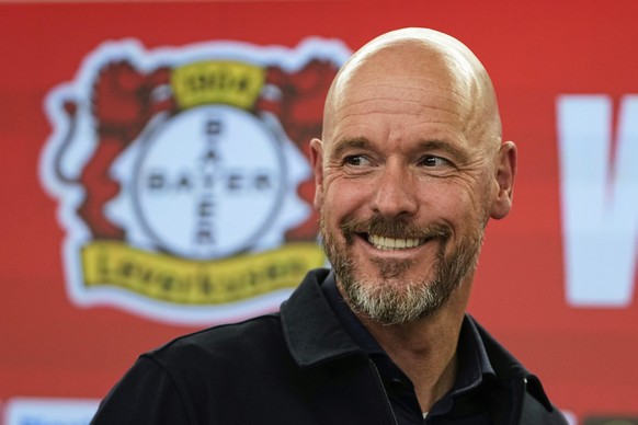 Erik ten Hag smiles during his presentation as new head coach of Bundesliga soccer club Bayer 04 Leverkusen at the BayArena stadium in Leverkusen, Germany, Monday, May 26, 2025. (AP Photo/Martin Meiss ...