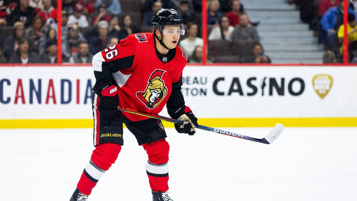 OTTAWA, ON - JANUARY 02: Ottawa Senators defenseman Erik Brannstrom 26 keeps eyes on the play during first period National Hockey League action between the Florida Panthers and Ottawa Senators on Janu ...