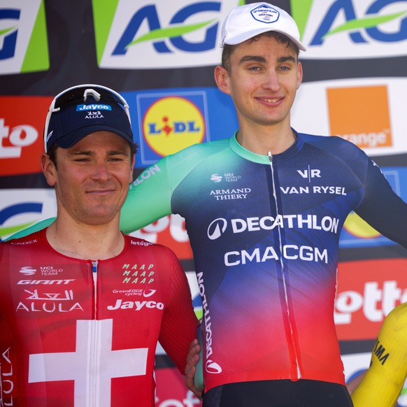epa12907150 (L-R) Second place Swiss cyclist Mauro Schmid of Team Jayco AlUla , winner French cyclist Paul Seixas of Decathlon CMA CGM Team, and third place British cyclist Ben Tulett of Team Visma -  ...
