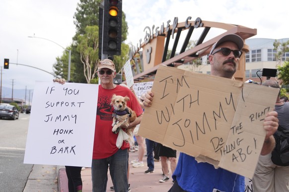 Demonstrators picket in response to the suspension of Jimmy Kimmel&#039;s late-night show outside of Walt Disney Studios in Burbank, Calif., on Thursday, Sept. 18, 2025. (AP Photo/Jae C. Hong)
Jimmy K ...