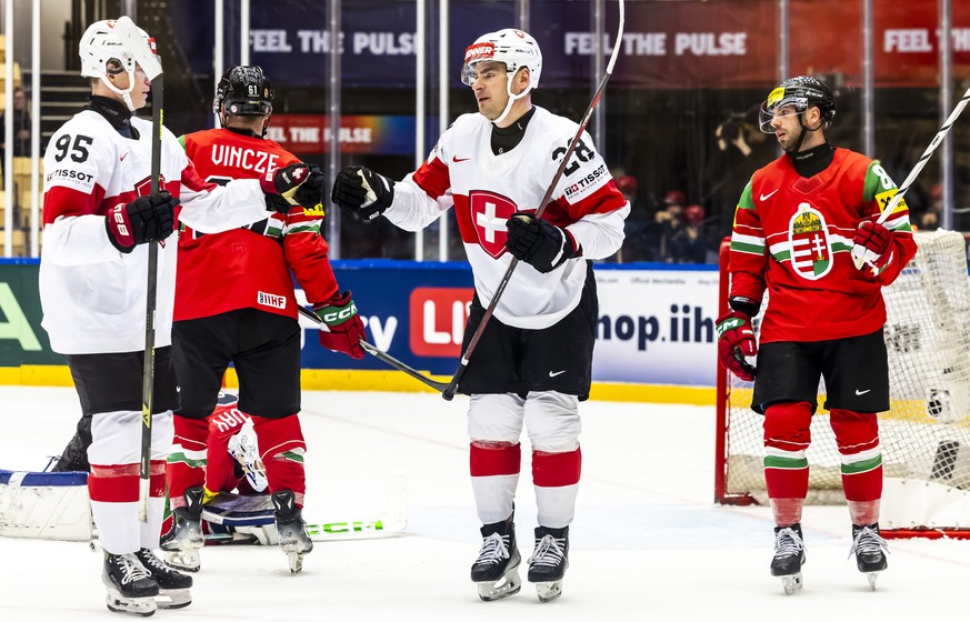 epa12114747 Switzerland&#039;s Timo Meier celebrates scoring the 0-4 goal during the IIHF 2025 World Championship preliminary round group B game between Hungary and Switzerland, in Herning, Denmark, 1 ...