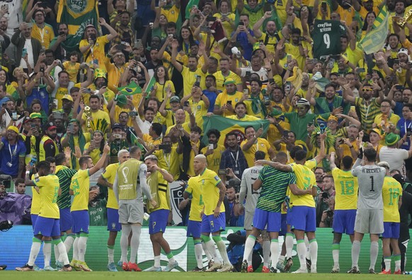 Brazil&#039;s soccer players greet fans at the end of the World Cup group G soccer match between Brazil and Serbia, at the Lusail Stadium in Lusail, Qatar, Thursday, Nov. 24, 2022. Brazil won 2-0. (AP ...