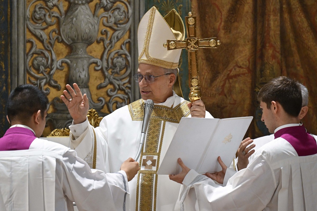 Newly elected Pope Leo XIV concelebrates Mass with the College of Cardinals inside the Sistine Chapel at the Vatican the day after his election as 267th pontiff of the Roman Catholic Church, Friday, M ...
