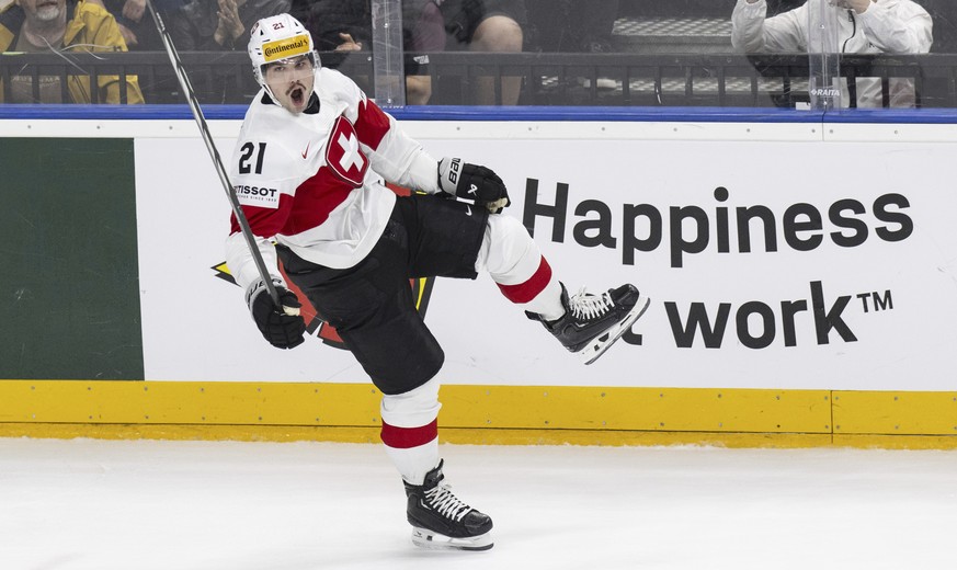 Switzerland&#039;s Kevin Fiala celebrates after scoring his side&#039;s third goal during the preliminary round match between Finland and Switzerland at the Ice Hockey World Championships in Prague, C ...