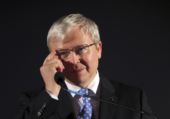 In this Sept. 6, 2013, file photo, former Australian Prime Minister Kevin Rudd adjusts his glasses during a speech at a pre-election rally in Mt. Druitt, Australia. Australia&#039;s government has rej ...