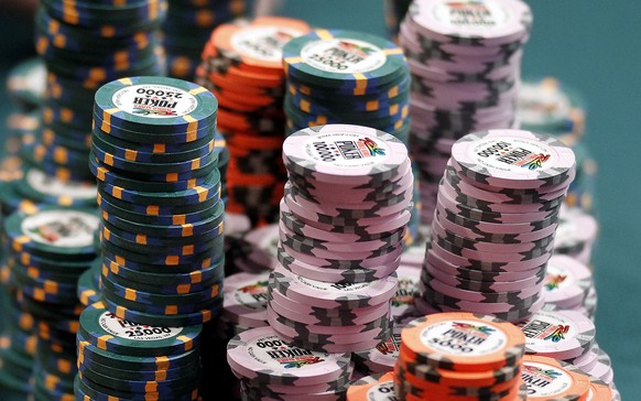 A stack of chips sits on a table during the main event at the World Series of Poker Tuesday, July 19, 2011, in Las Vegas. (AP Photo/Isaac Brekken)