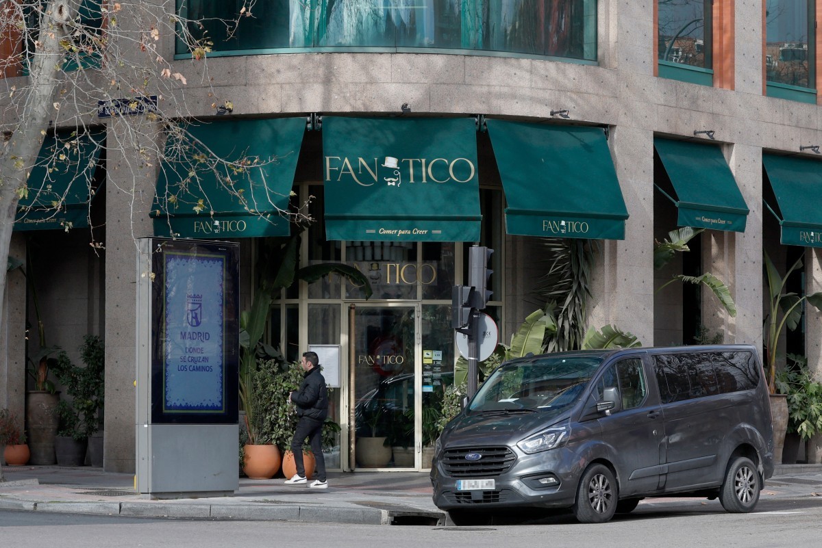 A picture taken on January 14, 2026 shows a view of the Fanatico restaurant in Madrid, after a fire allegedly started from flares lit up inside the restaurant, according to Spanish media. (Photo by Pi ...