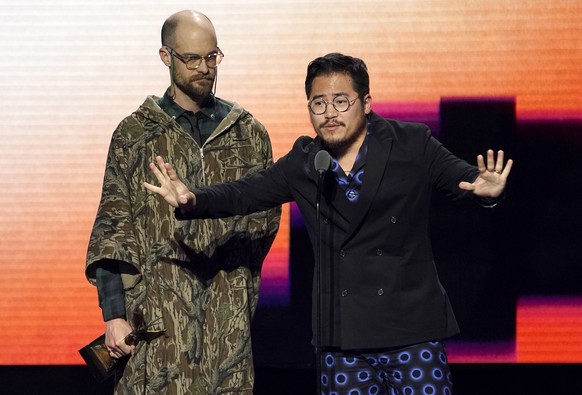 Daniel Scheinert, left, and Daniel Kwan accept the award for best screenplay for &quot;Everything Everywhere All at Once&quot; at the Film Independent Spirit Awards on Saturday, March 4, 2023, in Sant ...