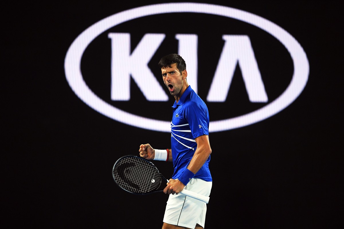 epa07317854 Novak Djokovic of Serbia reacts during his men's singles semi final match against Lucas Pouille of France at the Australian Open Grand Slam tennis tournament in Melbourne, Australia,  ...