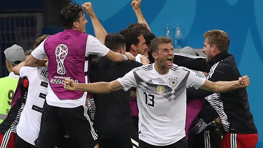 epa06834804 German player Thomas Mueller (C) reacts with teammates after the FIFA World Cup 2018 group F preliminary round soccer match between Germany and Sweden in Sochi, Russia, 23 June 2018.
(R ...
