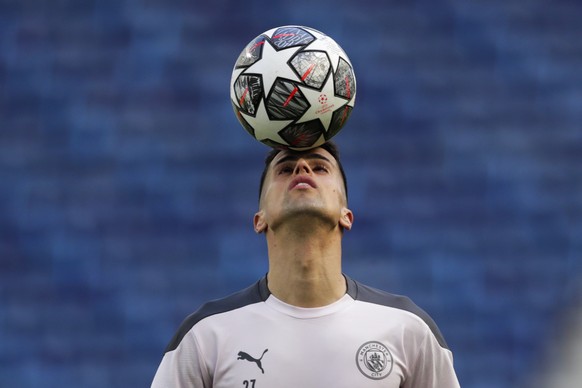 Manchester City&#039;s Joao Cancelo heads the ball during a training session ahead of the Champions League final match at the Dragao stadium in Porto, Portugal, Friday, May 28, 2021. Manchester City a ...