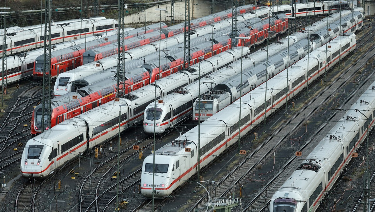 epa11100355 Local trains stand in front of the Main train station during a German Train Drivers' Union (GDL) strike in Frankfurt, Germany, 24 January 2024. The GDL called on its members to strike ...