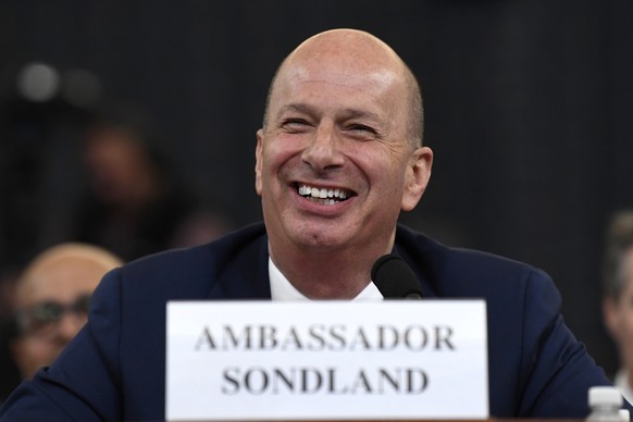 FILE -In this Nov. 20, 2019, file photo, U.S. Ambassador to the European Union Gordon Sondland testifies before the House Intelligence Committee on Capitol Hill in Washington. The â??three amigosâ? u ...