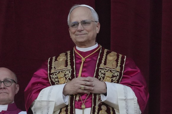 CORRECTS TO LEO, NOT LEONE - Newly elected Pope Leo XIV appears at the balcony of St. Peter&#039;s Basilica at the Vatican, Thursday, May 8, 2025. (AP Photo/Andrew Medichini)
Vatican Conclave New Pope