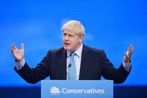 epa07888600 Britain's Prime Minister Boris Johnson delivers his keynote speech at the Conservative Party Conference in Manchester, Britain, 02 October 2019. The Conservative Party Conference runs from ...