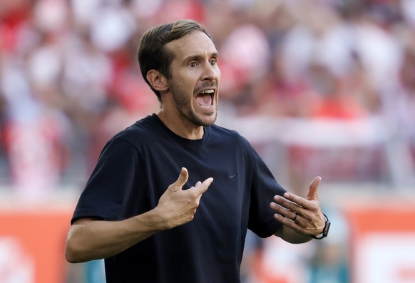 epa11562922 Head coach Julian Schuster of Freiburg reacts during the German Bundesliga soccer match between SC Freiburg and VfB Stuttgart in Freiburg, Germany, 24 August 2024. EPA/RONALD WITTEK CONDIT ...