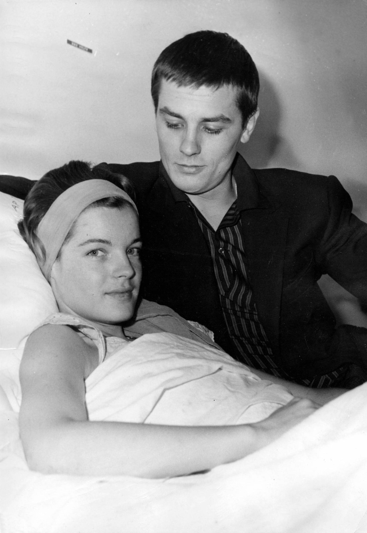 Mar. 15, 1961 - Neuilly-sur-Seine, France - ALAIN DELON visiting ROMY SCHNEIDER in Neuilly Clinic after her appendix operation. It was during the filming of Christine that ROMY SCHNEIDER fell in love  ...