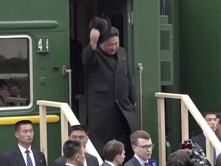 In this image from video released by Primorsky Regional Administration Press Service, North Korean leader Kim Jong Un gets off a train upon arrival at Khasan train station in Primorye region, Russia,  ...