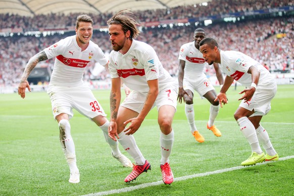 STUTTGART, GERMANY - MAY 16:  Martin Harnik of Stuttgart celebrates his team's second goal with his team mates Daniel Ginczek (L) and Daniel Didavi (R) during the Bundesliga match between VfB Stuttgart and Hamburger SV at Mercedes-Benz Arena on May 16, 2015 in Stuttgart, Germany.  (Photo by Simon Hofmann/Bongarts/Getty Images)