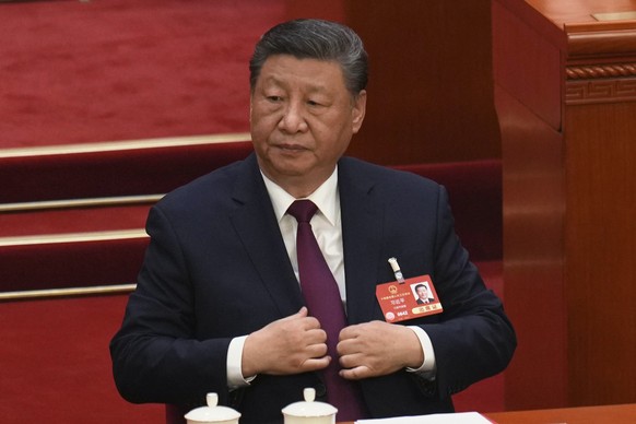 Chinese President Xi Jinping attends the closing ceremony of the National People&#039;s Congress held at the Great Hall of the People in Beijing, Tuesday, March 11, 2025. (AP Photo/Ng Han Guan)
China  ...
