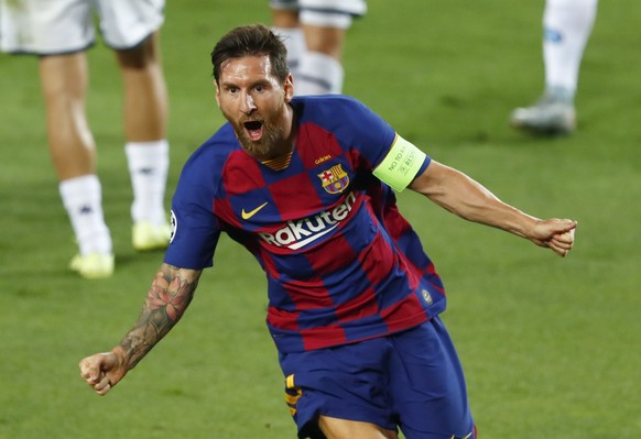 Barcelona&#039;s Lionel Messi celebrates after scoring his side&#039;s second goal during the Champions League round of 16, second leg soccer match between Barcelona and Napoli at the Camp Nou Stadium ...