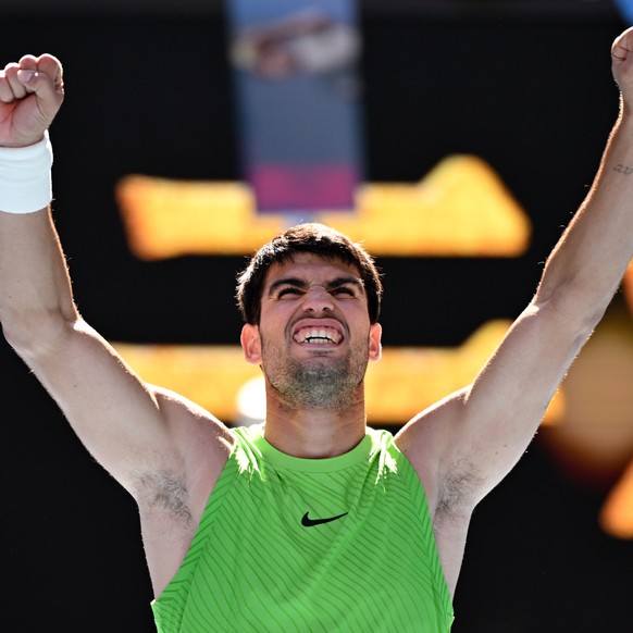 epa12666496 Carlos Alcaraz of Spain celebrates match point during the Men's 2nd round match against Yannick Hanfmann of Germany on day 4 of the 2026 Australian Open tennis tournament at Melbourne ...