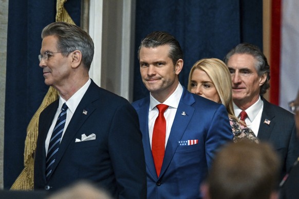 Defense Secretary nominee Pete Hegseth, from second left, Attorney General nominee Pam Bondi and Secretary of the Interior nominee former North Dakota Gov. Doug Burgum, arrive before the 60th Presiden ...