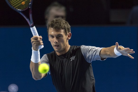 epa07112118 Switzerland&#039;s Henri Laaksonen in action during his first round match against Italy&#039;s Marco Cecchinato at the Swiss Indoors tennis tournament at the St. Jakobshalle in Basel, Swit ...