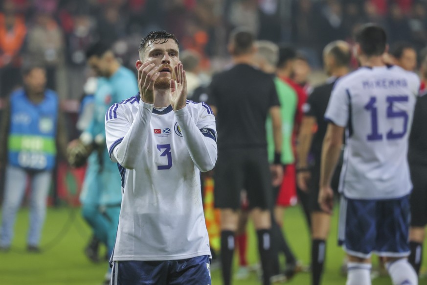 Scotland&#039;s Andrew Robertson applauds to supporters at the end of the international friendly soccer match between Turkey and Scotland at Diyarbakir stadium in Diyarbakir, Turkey, Wednesday, Nov. 1 ...