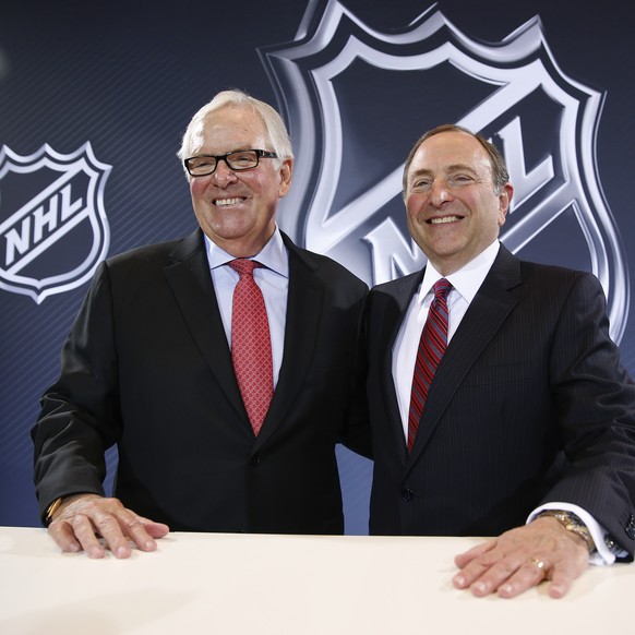 NHL Commissioner Gary Bettman, right, and Bill Foley pose for photographers during a news conference Wednesday, June 22, 2016, in Las Vegas. Bettman announced an expansion franchise to Las Vegas after ...