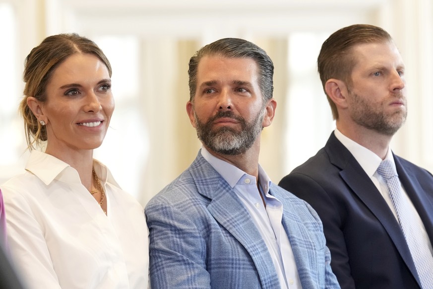Bettina Anderson, Donald Trump Jr. and Eric Trump attend the meeting between President Donald Trump and European Commission President Ursula von der Leyen at the Trump Turnberry golf course in Turnber ...