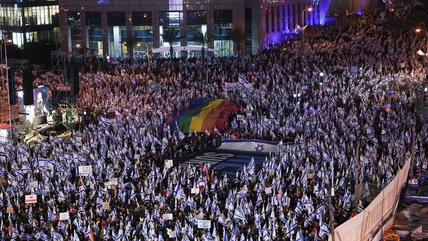Israelis protest plans by Prime Minister Benjamin Netanyahu's government to overhaul Israel's legal system, in Tel Aviv, Israel, Saturday, March 18, 2023. (AP Photo/Tsafrir Ab...