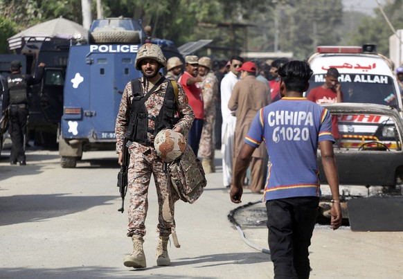 Pakistani security personnel arrive at the Chinese Consulate in Karachi, Pakistan, Friday, Nov. 23, 2018. Police say gunmen have stormed the Chinese Consulate in the country&#039;s southern port city  ...