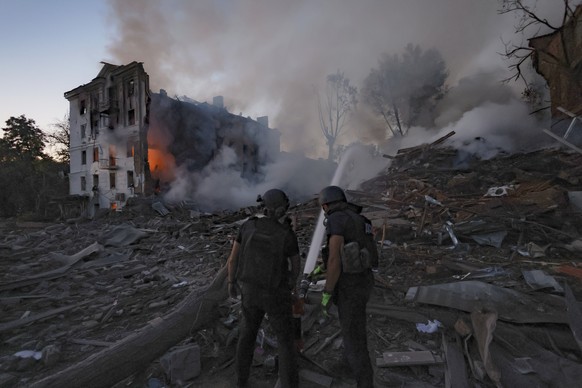 Emergency services personnel work to extinguish a fire at a residential house destroyed by a Russian air strike on Kramatorsk, Ukraine, on Thursday, July 31, 2025. (AP Photo/Yevhen Titov)
Russia Ukrai ...