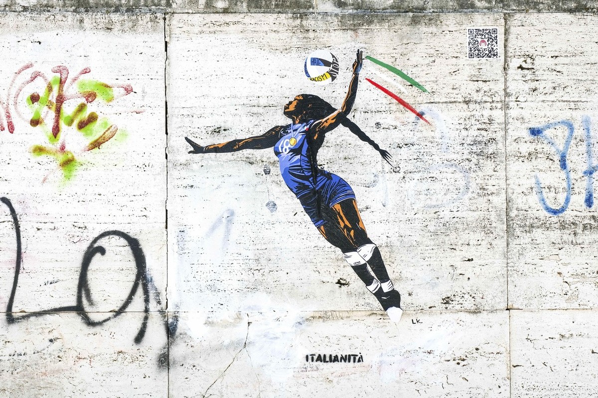 A view of a mural in homage to the Italian volleyball player Paola Egonu, on a wall, in front of the CONI headquarters in Viale Tiziano in Rome, Monday, Aug. 12 2024. (Mauro Scrobogna/LaPresse via AP)