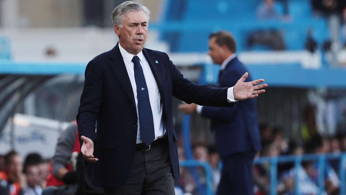 Napoli's head coach Carlo Ancelotti gestures during the Italian Serie A soccer match between Spal and Napoli, at the Paolo Mazza stadium in Ferrara, Italy, Sunday, Oct. 27, 2019. (Serena Campanni ...